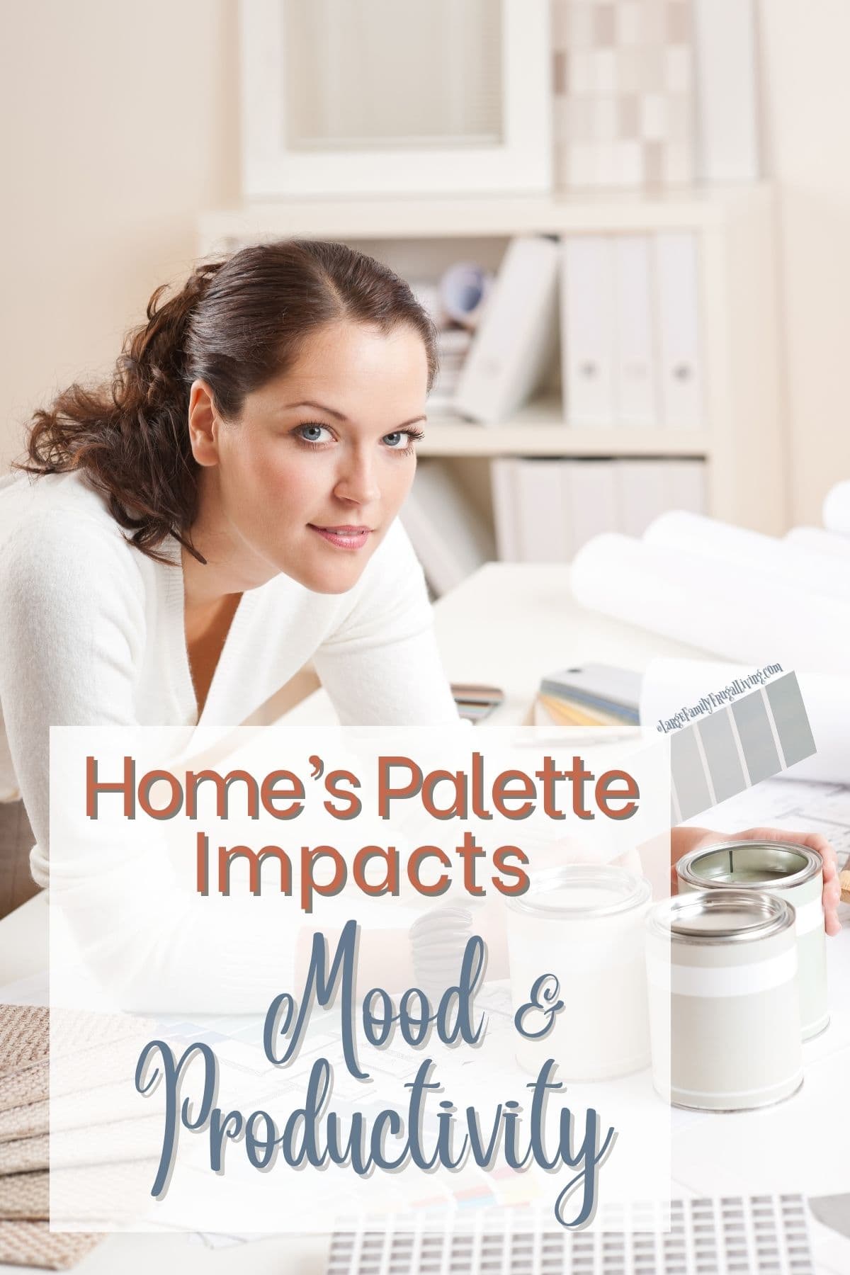 Female interior designer in office with paint and color swatches | Home's Palette Impacts Mood & Productivity